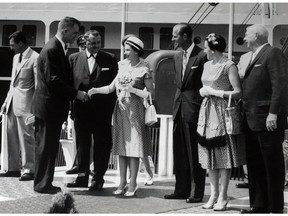 Master photographer Spike Bell has assembled some of his most impressive works in a new hardcover book titled Memoirs of a Border City.  Bell took this photograph of Queen Elizabeth being greeted by Michigan Governor G. Mennan Williams and then Windsor Mayor Mike Patrick on July 3, 1959 at Dieppe Park.  Also in photo, City of Windsor clerk Jon Adamac, left, Duke of Edinburgh and R.P. Scherer, right.