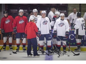 Members of the Windsor Spitfires return to the ice on the first day of training camp at the WFCU Centre, on Thursday.