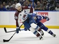 FILE - Colorado Avalanche center Nathan MacKinnon (29) controls a puck in front of Tampa Bay Lightning center Anthony Cirelli (71) during the third period of Game 4 of the NHL hockey Stanley Cup Finals, June 22, 2022, in Tampa, Fla. MacKinnon expects to sign contract extension with the Avalanche soon. The face of the franchise for the reigning Stanley Cup champions says he hopes the deal gets done before the season starts in October.