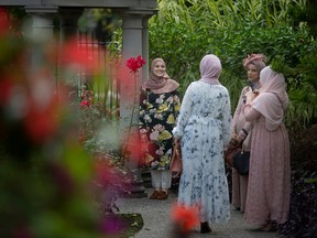 Tours of the garden at Willistead Manor are given during the 2nd annual High Tea and Garden Party, on Sunday, Sept. 11, 2022.