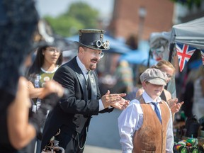 Festival goers dressed in steampunk costumes at the Amherstburg Uncommon Festival, on Saturday, Sept. 17, 2022.