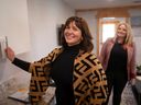 Krista Rempel, left, Executive Director at the Bridge Youth Resource Centre, is joined by Fiona Coughlin, Executive Director and CEO, Habitat for Humanity Windsor-Essex as she gets a first look at the multi-unit 3D printed home donated to the centre by the Habitat for Humanity, on Sherk Street in Leamington on Thursday, Oct. 27, 2022.