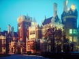 Exterior of Casa Loma in Toronto at dusk.