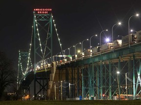 The Ambassador Bridge at night is shown in this December 2021 file photo.