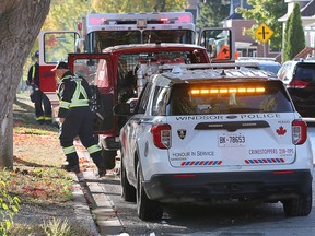 Windsor Fire and Rescue Services personnel are shown at the scene of a house fire in the 700 block of Bridge Avenue on Monday, October 10, 2022.