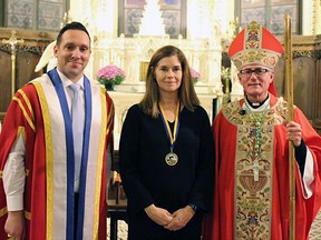 The Red Mass (Mass for lawyers and judges) was held on Thursday at Assumption Church. It's the first time in 29 years that a Red Mass was held. From left are Dr. John Cappucci, principal and vice-chancellor of Assumption University, Chief Justice Bridget McCormack of Michigan Supreme Court and Bishop Ronald Fabbro