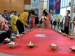 University of Windsor students light diya candle lamps at the student centre in celebration of Diwali on Oct. 24, 2022.