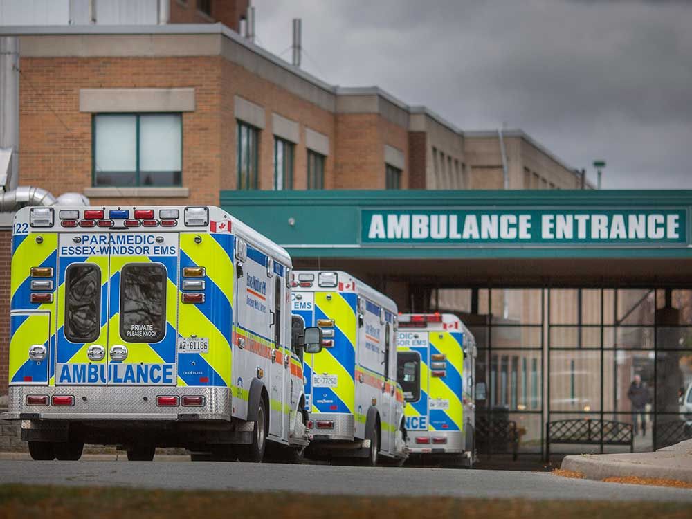  essex-windsor ems ambulances wait at the emergency room entrance at windsor regional hospital’s met campus on oct. 17, 2022.