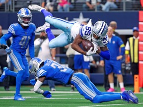 Dallas Cowboys wide receiver Noah Brown is tackled by safety Kerby Joseph and fumbles during the second quarter at AT&T Stadium.