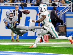 Detroit Lions wide receiver Josh Reynolds tries to make a catch against Miami Dolphins cornerback Kader Kohou during the second half at Ford Field.