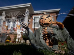 Front lawn Halloween decorations at 1558 Marentette Ave., are seen on Thursday, Oct. 27, 2022.