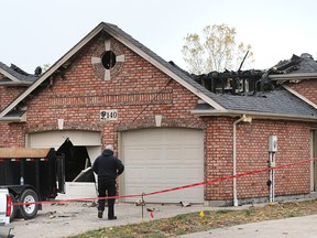 Extensive fire damage to a home on Marina Grove Crescent in Lakeshore on Oct. 19, 2022.