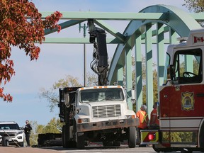 The westbound lanes of Wyandotte St. East between Martinique and Riverdale were closed for over an hour on Tuesday, October 4, 2022. A truck's boom extension did not clear the Little River Bridge frame. No injuries were reported. Windsor police and firefighters are shown on scene.