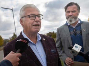 City council candidates Jim Morrison (Ward 10), left, and Kieran McKenzie (Ward 10) hold a press conference at Walker Homesites Park to discuss park infrastructure, on Thursday, Oct. 13, 2022.