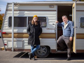 Merissa Mills of Street Angels and Rodger Fordham of Feeding Windsor stand next to the trailer to be renovated as the Soup Shack, serving those in need in downtown Windsor. Photographed Oct. 21, 2022.
