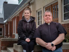 Merissa Mills, administrator with Street Angels Windsor-Essex, is shown March 30, 2022, with Rev. Paul Poolton outside St. Augustine of Canterbury Anglican Church. The organization is now moving to New Song Church in Ford City as part of a partnership with Feeding Windsor.