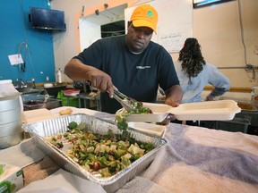 Anthony Nelson, manager at Street Help, prepares a Thanksgiving meal on Sunday, October 9, 2022. The organization handed out hundreds of meals over the weekend.
