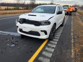 A 72-year-old Brampton man was charged with careless driving after a vehicle collided with a "crash truck" protecting construction workers on Highway 401 on Thursday, Nov. 24, 2022, in Dutton-Dunwich. (OPP Twitter photo)