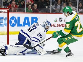 Matt Murray of the Toronto Maple Leafs makes a save against Connor Dewar of the Minnesota Wild in the second period of the game at Xcel Energy Center on November 25, 2022 in St Paul, Minnesota.