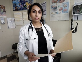 Dr. Kulvinder Kaur Gill, above in her clinic in Brampton in 2017, said a vaccine was not needed against the virus, that most people had natural immunity to COVID-19 and there was no scientific rationale for keeping people at home to short-circuit its spread.