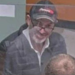 Windsor police are looking for a suspect in bank fraud Surveillance camera image of a man who ripped off several Windsor banks. Image released by Windsor Police on November 23, 2022.