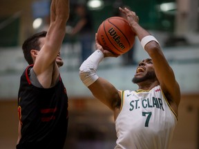 St. Clair's Jalen Harmon takes a shot in OCAA men's basketball action against the Canadore Panthers on Saturday at the SportsPlex.