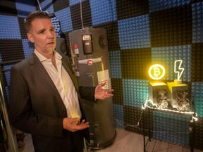 Owner and developer, Ray Blanchard, explains where Bitcoin mining happens during the unveiling of The Bitcoin Building at 477 Pelissier Street, Tuesday, November 1, 2022.