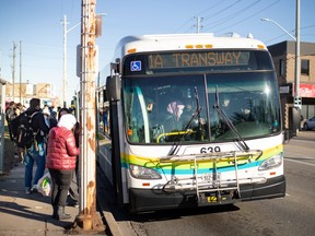 WINDSOR, ONT:. NOVEMBER 25, 2022 - People board a Transit Windsor bus on Tecumseh Road East on Friday, Nov. 25, 2022.