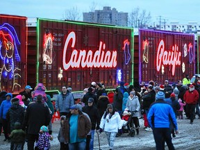Families enjoy the lights of the CP Holiday Train in Windsor in November 2019.