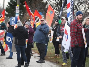 Federal public service union members protest in front of MP Irek Kusmierczyk constituency office in Windsor on Monday, November 28, 2022.