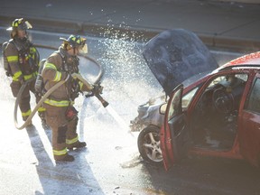 Windsor fire crews work to extinguish a vehicle fire on Wyandotte Street East, east of Drouillard Road, on Wednesday, Nov. 23, 2022.  It is unknown if any injuries are being reported.