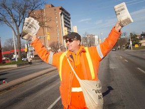 Good deeds from good fellows. CUPE Local 82's Rob Kolody hawks newspapers for donations for the Windsor Goodfellows at the intersection of Tecumseh Road and Ouellette Avenue, on Thursday, Nov. 24, 2022. Fundraisers for the charity will be hitting local streets until Saturday.