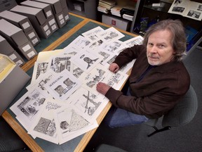 Mike Graston, former editorial cartoonist with the Windsor Star, is shown at the University of Windsor's Leddy Library on Tuesday, November 8, 2022. Graston has donated much of his original artwork to the institution.