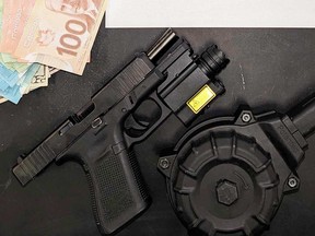 A Glock 43 handgun with a drum-style ammunition magazine, seized by Windsor police in a raid on Nov. 22, 2022.