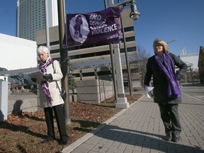 Hiatus House held a flag raising ceremony on Friday, Nov. 25, 2022, at Charles Clark Square in Windsor to recognize International Day for the Elimination of Violence Against Women. Windsor city councillor Jo-Anne Gignac, left, and Hiatus House executive director Sylvie Guenther are shown during the event.