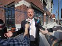 Larry Horwitz, newly re-elected chairperson of the Wyandotte Town Centre Business Improvement Association speaks during a press conference on Wyandotte Street East on Wednesday, November 2, 2022.