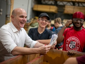 The Honourable Randy Boissonnault, Minister of Tourism and Associate Minister of Finance, visits with students in the Enhanced Construction Program at the United Brotherhood of Carpenters Local 494, on Wednesday, Nov. 9, 2022.