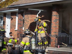 Windsor firefighters attend a house fire in the 700 block of Randoloph Ave. on Nov. 1, 2022.