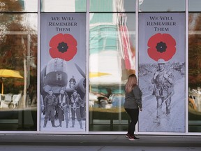 Canadian War Museum photos are shown on Windsor City Hall on Wednesday, November 2, 2022.