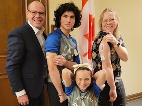 Lucas Makhlouf is a Grade 12 student at Cardinal Carter Secondary School living with Type 1 diabetes.  Diagnosed at a young age, Makhlouf got involved in advocacy early on. At Essex MP Chris Lewis's office in Ottawa on Monday, Nov. 14, 2022, left to right are: Lewis, Lucas Makhlouf, Leah MacKinnon and Erin Elgersma. Handout photo by Charlie Makhlouf.
