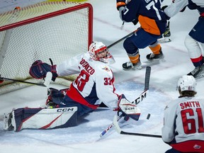 Windsor Spitfires' goalie Joey Costanzo, scrambles to make a save during the first period of Friday's 4-3 shootout lost to the Flint Firebirds at the WFCU Centre.