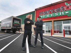 Mark Romualdi, left, and Jonathan Reaume, co-owners of The Mercato Fresh Market are shown at the new Banwell Road business on Tuesday, November 15, 2022.