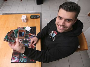 Windsor Yu-Gi-Oh! enthusiast Adam Teshuba shows cards from his personal deck on Nov. 28, 2022. Teshuba is top ranked in the 'GOAT format' of the fantasy trading card game.