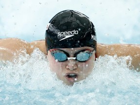 Margaret MacNeil of Canada competes in the Women's 50m Butterfly heats on day one of the 2022 FINA World Short Course Swimming Championships at Melbourne Sports and Aquatic Centre on December 13, 2022 in Melbourne, Australia.