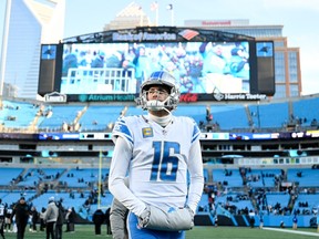 Jared Goff of the Detroit Lions walks off the field after the game against the Carolina Panthers at Bank of America Stadium on December 24, 2022 in Charlotte, North Carolina.