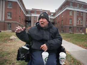 Steve Warren, 60, a resident at 1616 Ouellette Ave., speaks in front of the Windsor apartment building on Dec. 16, 2022.