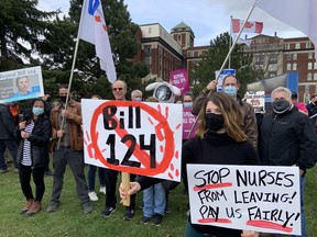 Health-care workers rally against Ontario's Bill 124 in front of the Ottawa Civic Hospital, April 26, 2022.