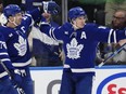 Maple Leafs captain John Tavares, left, celebrates his goal with Mitch Marner during first period NHL action against the Ducks in Toronto, Tuesday, Dec. 13, 2022.