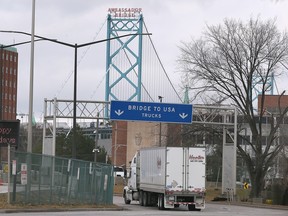 A truck heads onto the Ambassador Bridge from Windsor on Thursday, December 15, 2022 in Windsor.