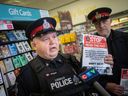 Const. Terry Seguin (left) and Deputy Chief Jason Woods (right) of LaSalle police talk about raising awareness of the 'gift card scam.' Photographed in LaSalle on Dec. 8, 2022.